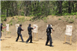 Police officers approaching targets