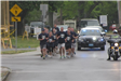 Officers running with police escort 9