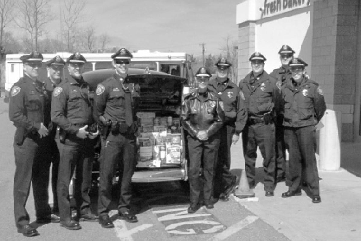 Police officers with donated food