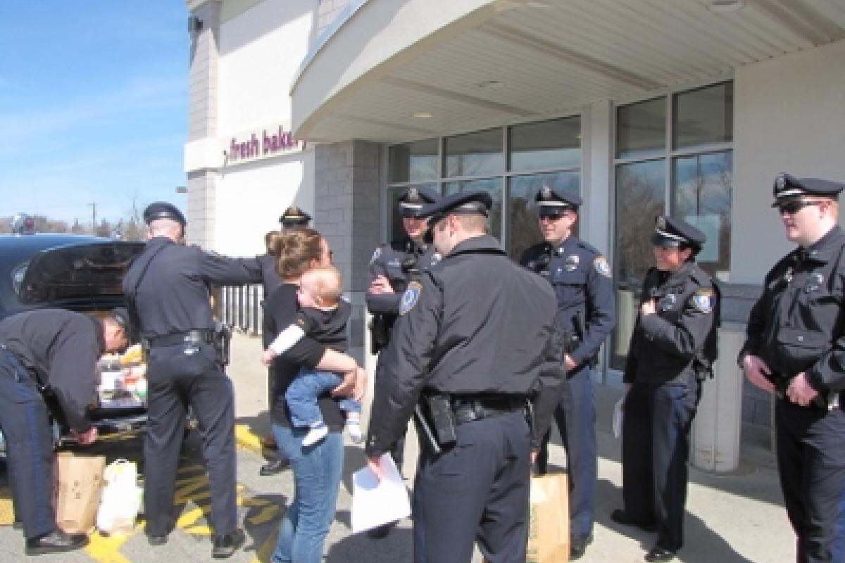 A citizen chatting with police officers