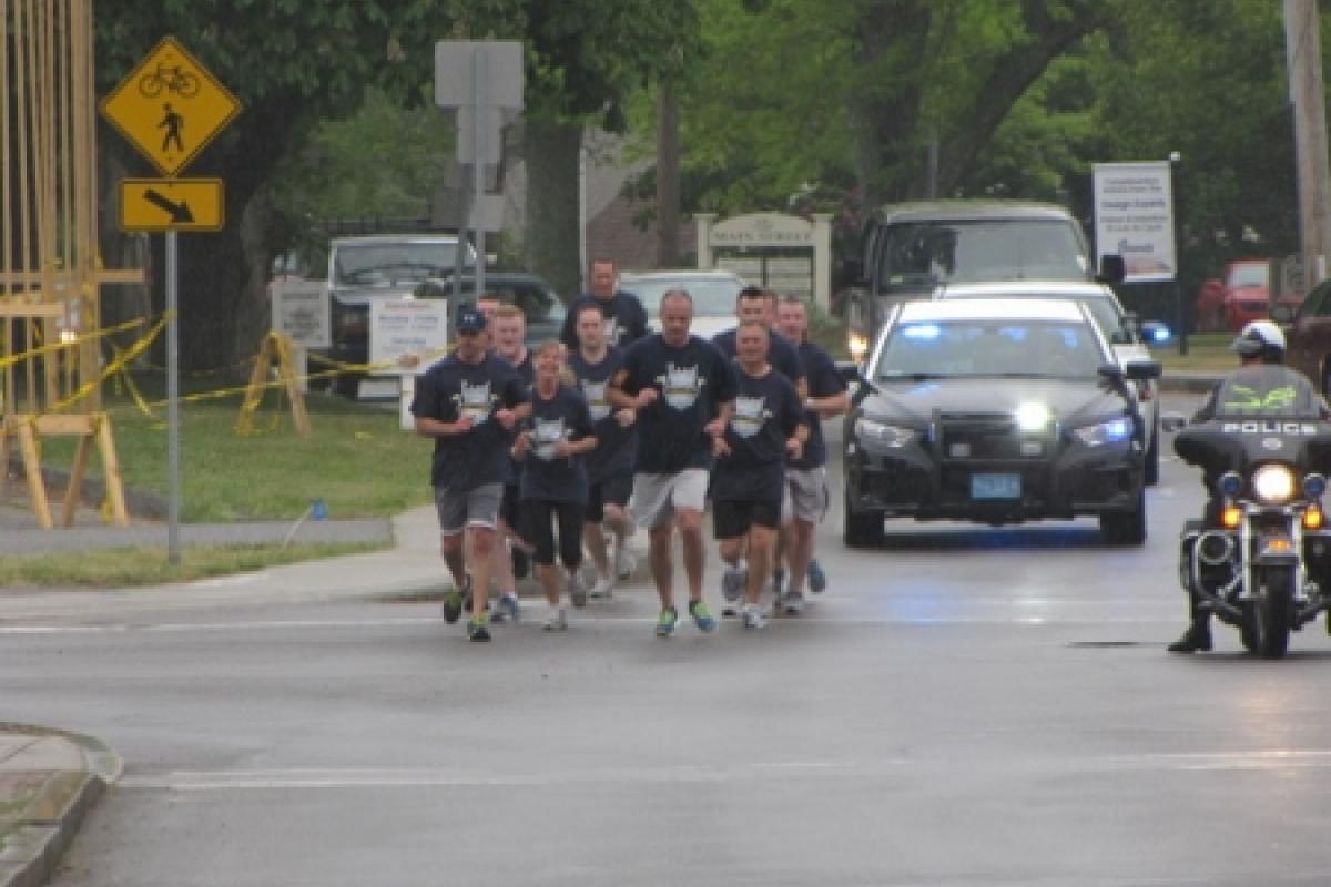 Officers running with police escort 9